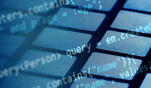 close up of code superimposed over keyboard keys