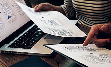 people reviewing wireframes
