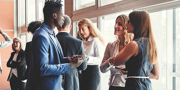 group of people socializing at fundraising event