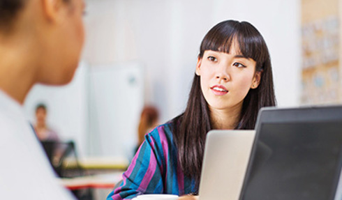 people collaborating in office