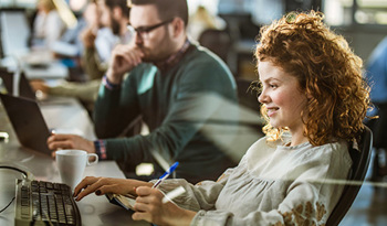 people working on computers at office
